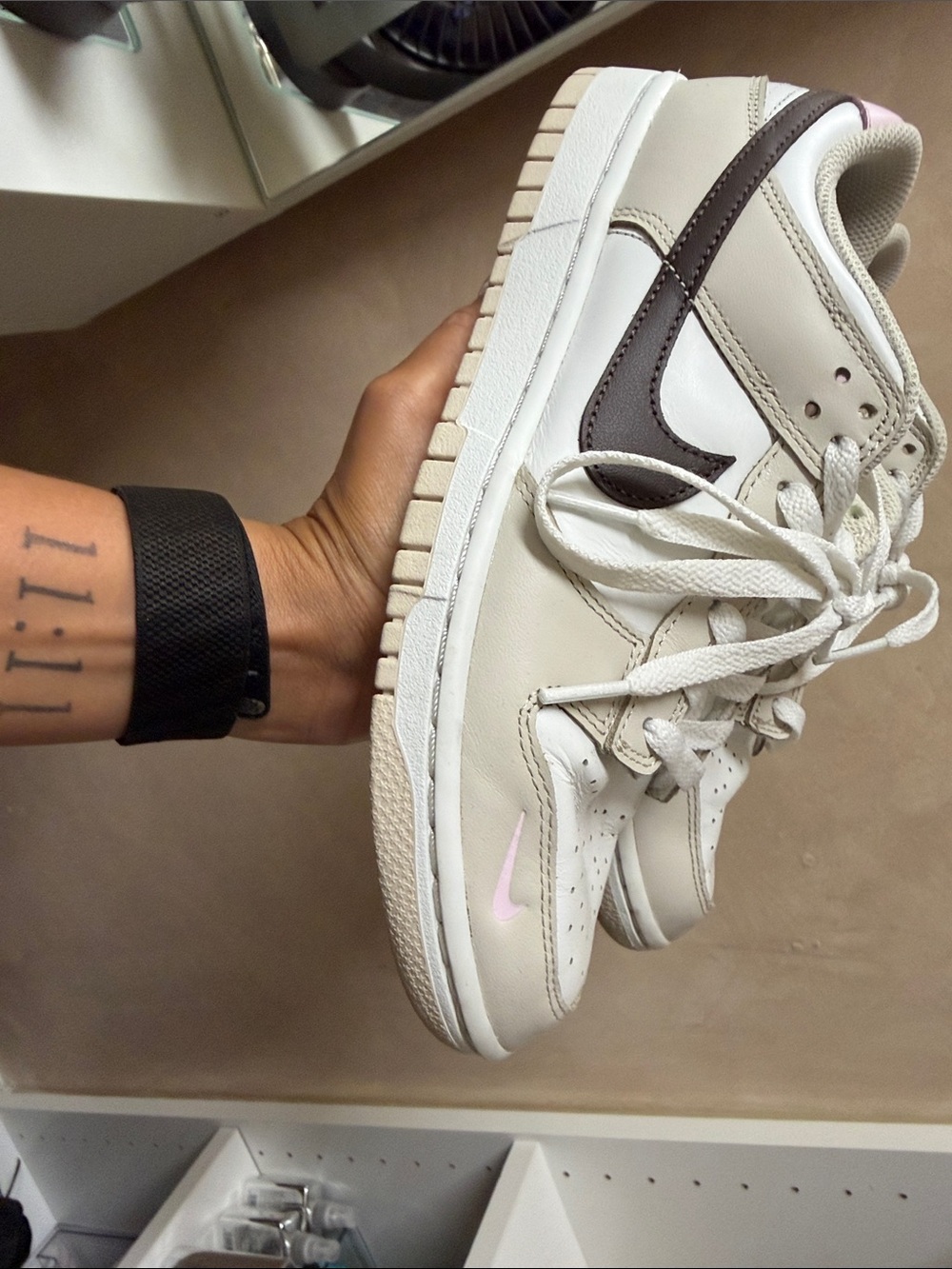 Nike Women's Cream and Brown Low-Top Sneakers with Pink Swoosh